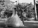 Black and white image of wedding couple dancing 
