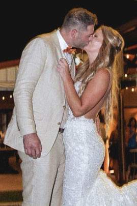 bride and groom kissing