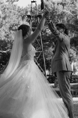 A bride and groom dancing